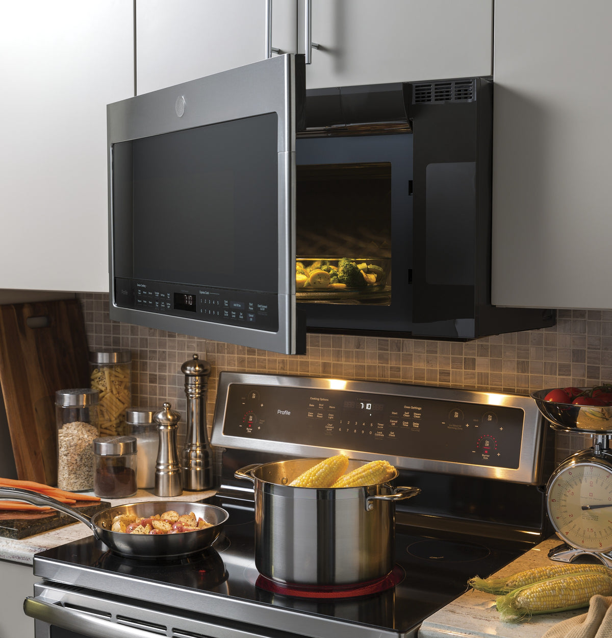 Scratch & Dent GE Profile™ 2.1 Cu. Ft. Over-the-Range Sensor Microwave Oven PVM9005RYSS