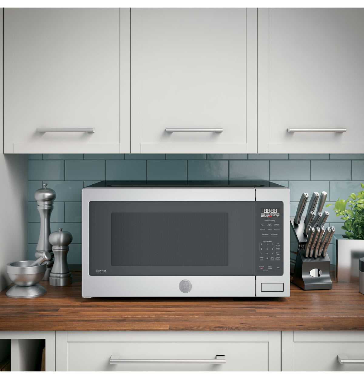 GE Profile™ 2.2 Cu. Ft. Countertop Sensor Microwave Oven PCST22U1WSS