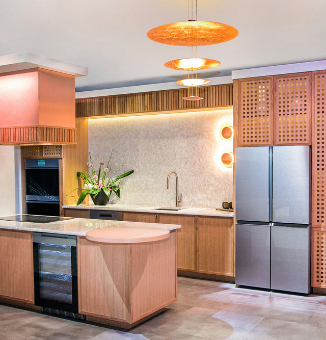 Café™ ENERGY STAR® 22.9 Cu. Ft. Smart Counter-Depth Quad-Door Refrigerator in Platinum Glass with Dual-Dispense AutoFill Pitcher CHE23DM5WS5