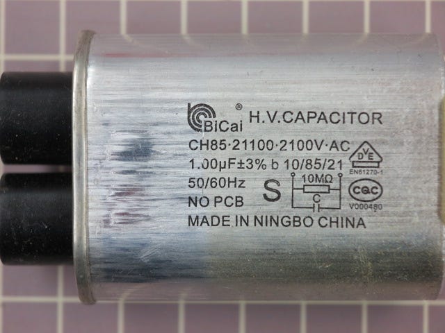 Capacitor (1.00 uf + 3%) (50/60hz) 0CZZW1H001Q