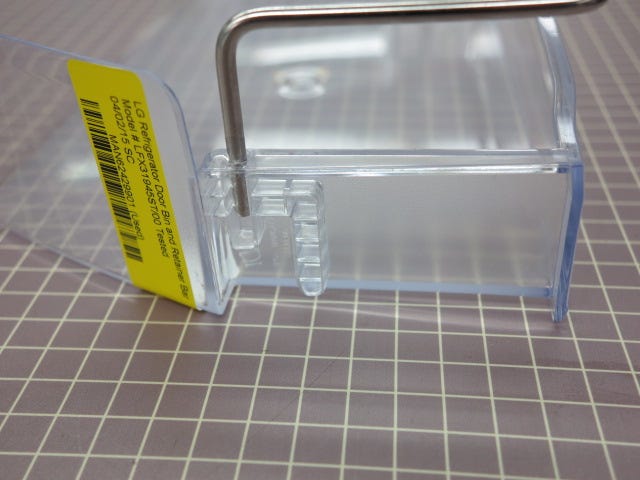 Door Bin and Retainer Bar MAN62429901