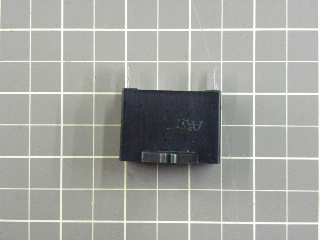 Capacitor 0CZZW1M001A