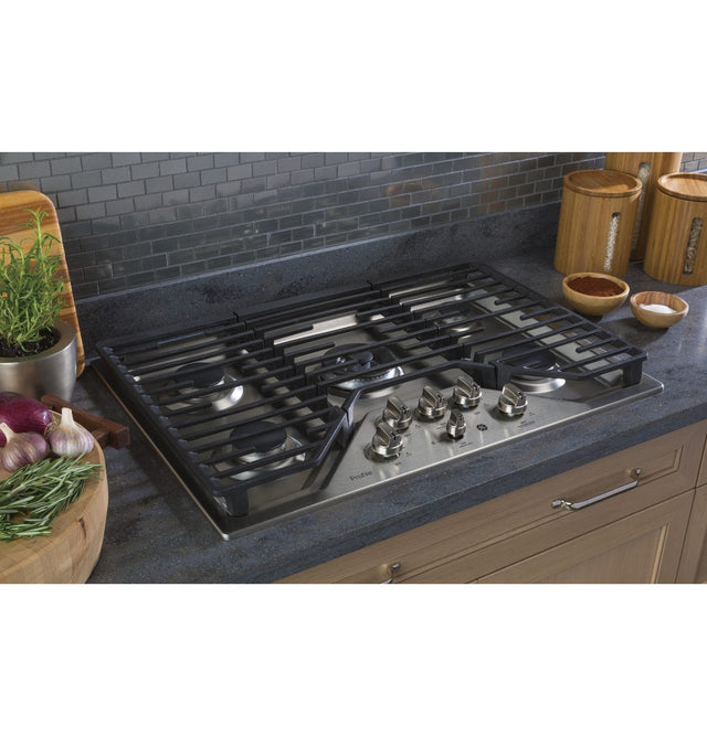 GE Profile™ 30" Built-In Tri-Ring Gas Cooktop with 5 Burners and Included Extra-Large Integrated Griddle PGP9030SLSS