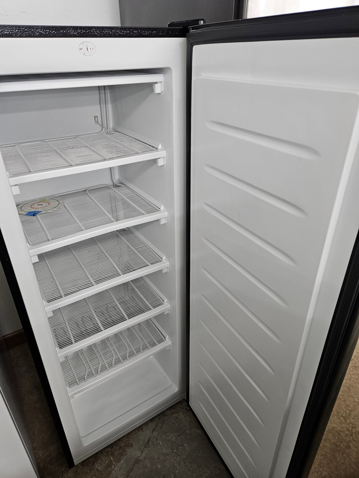 Reconditioned Frigidaire 6.5 Cu. Ft. Upright Freezer EFRF696-AMZ-6COM