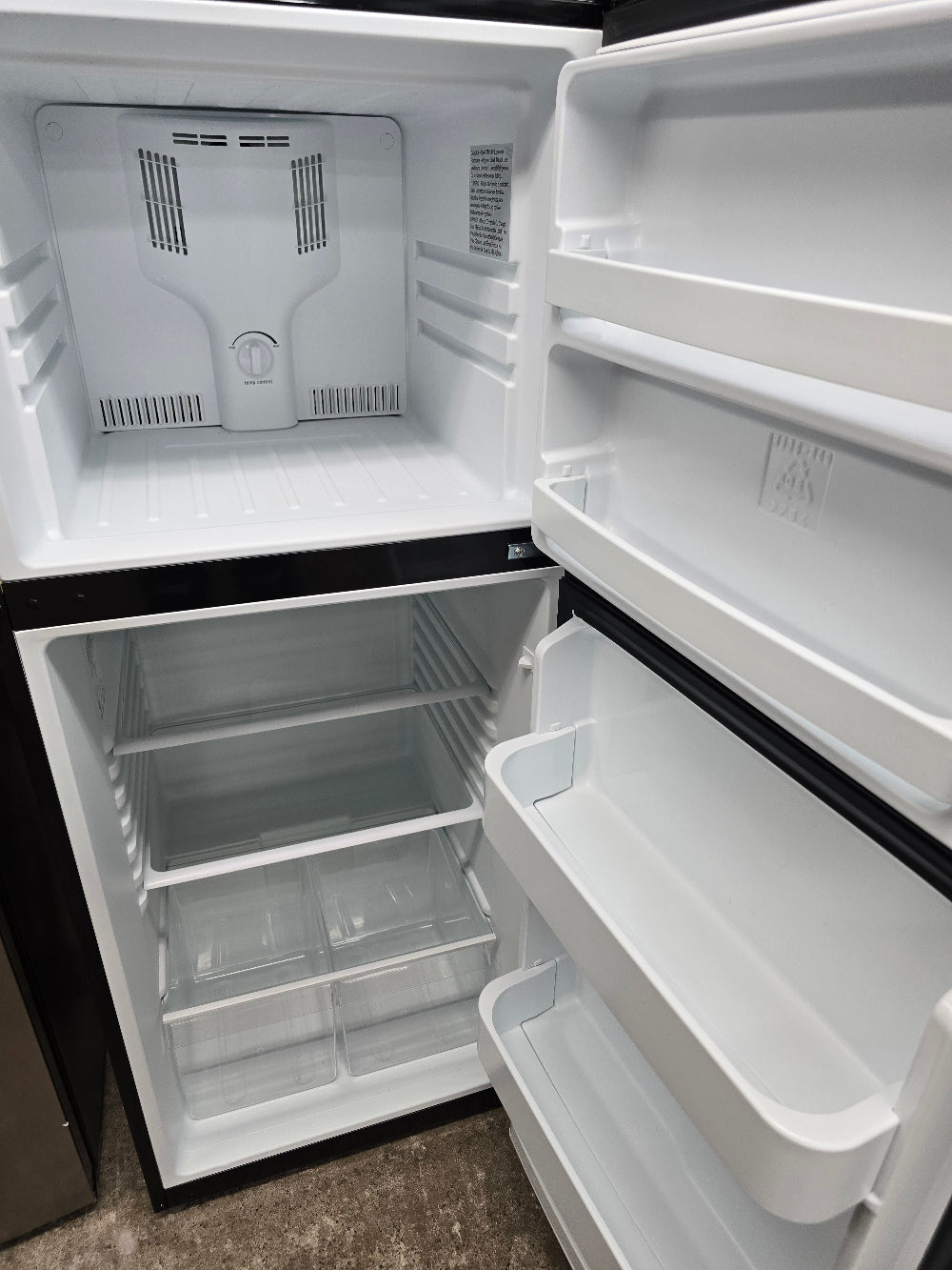 Reconditioned Frigidaire 12 Cu. Ft. Top Freezer Refrigerator FFTR1222QB