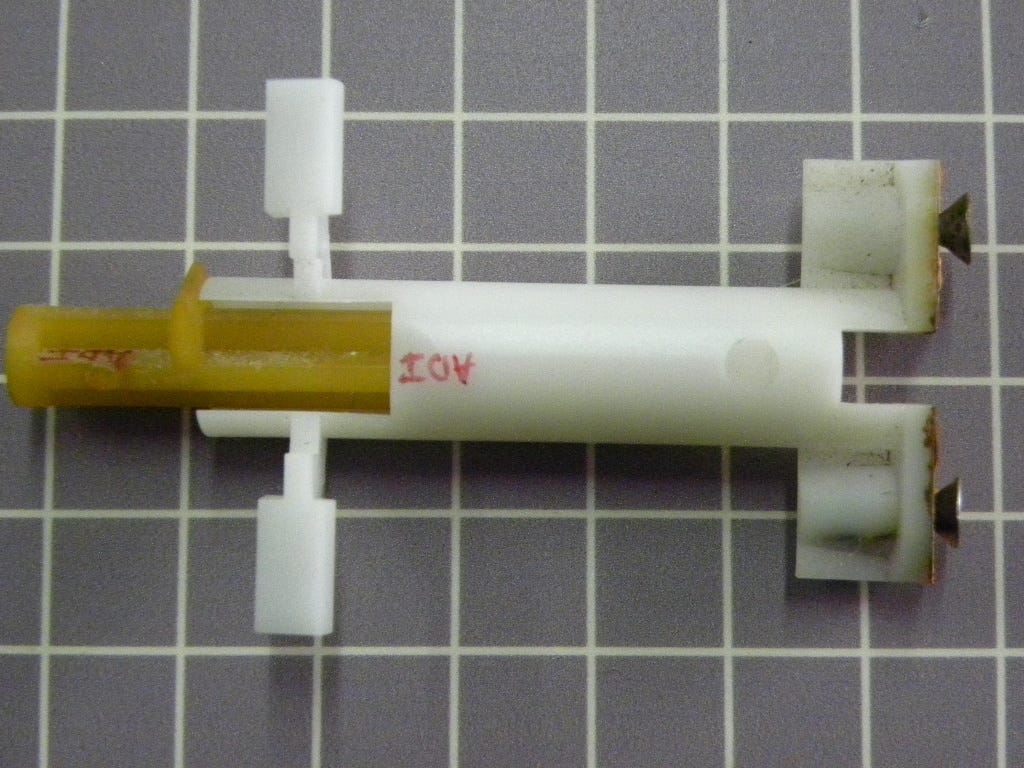 Guide Tube & Lid Switch Plunger 22002757