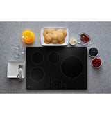 GE Profile 30" Built-In Touch Control Induction Cooktop PHP7030DTBB