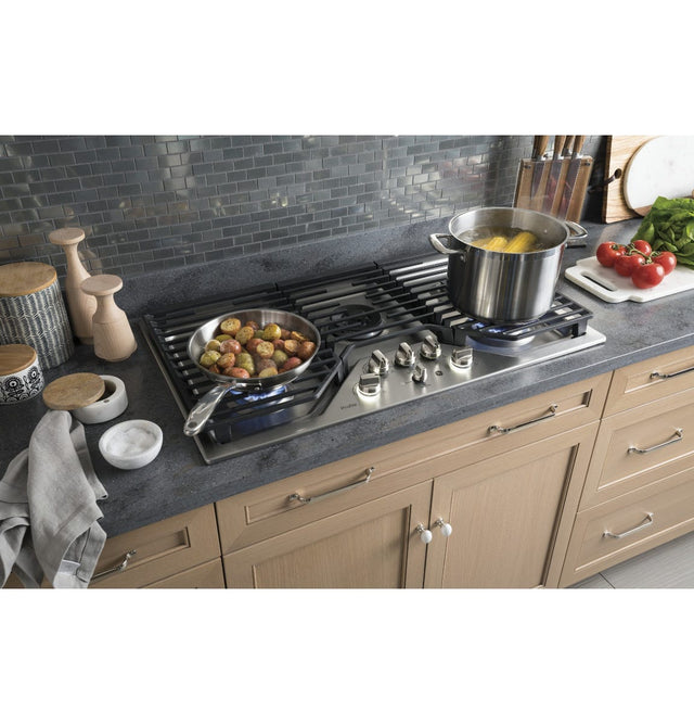 GE Profile™ 36" Built-In Tri-Ring Gas Cooktop with 5 Burners and Included Extra-Large Integrated Griddle PGP9036SLSS