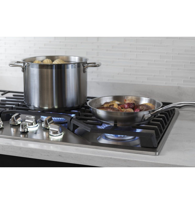 GE Profile™ 36" Built-In Tri-Ring Gas Cooktop with 5 Burners and Included Extra-Large Integrated Griddle PGP9036SLSS