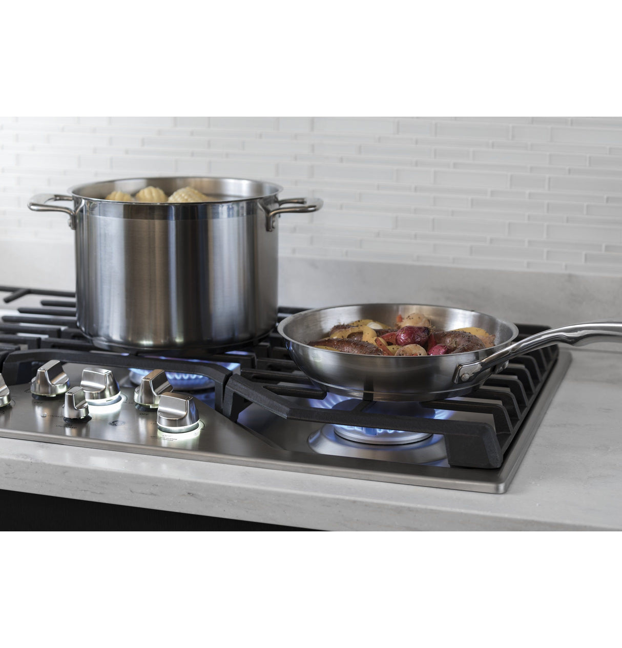 GE Profile 30" Built-In Gas Cooktop with 5 Burners and an Optional Extra-Large Cast Iron Griddle PGP7030SLSS