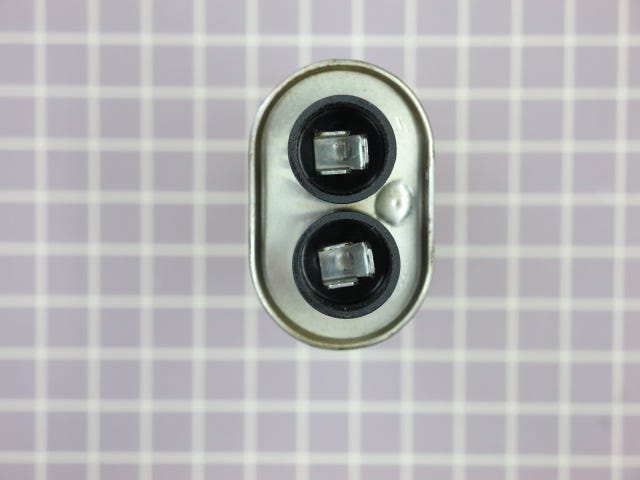 Capacitor R9900305