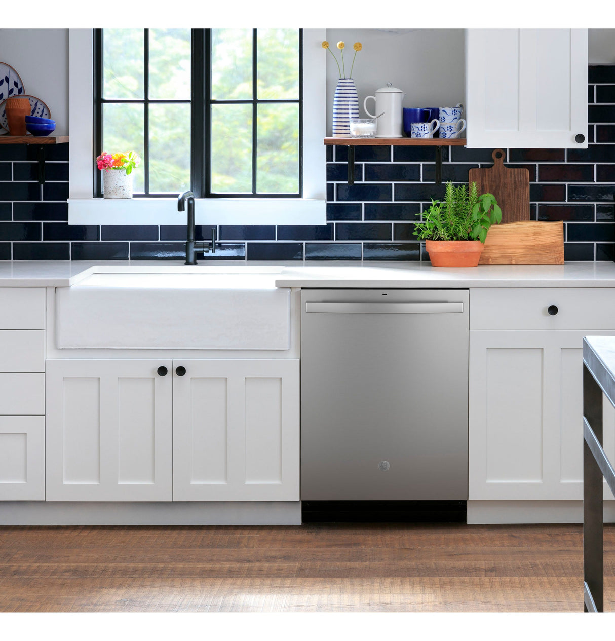 GE ENERGY STAR® Top Control with Plastic Interior Dishwasher with Sanitize Cycle & Dry Boost GDT535PSRSS