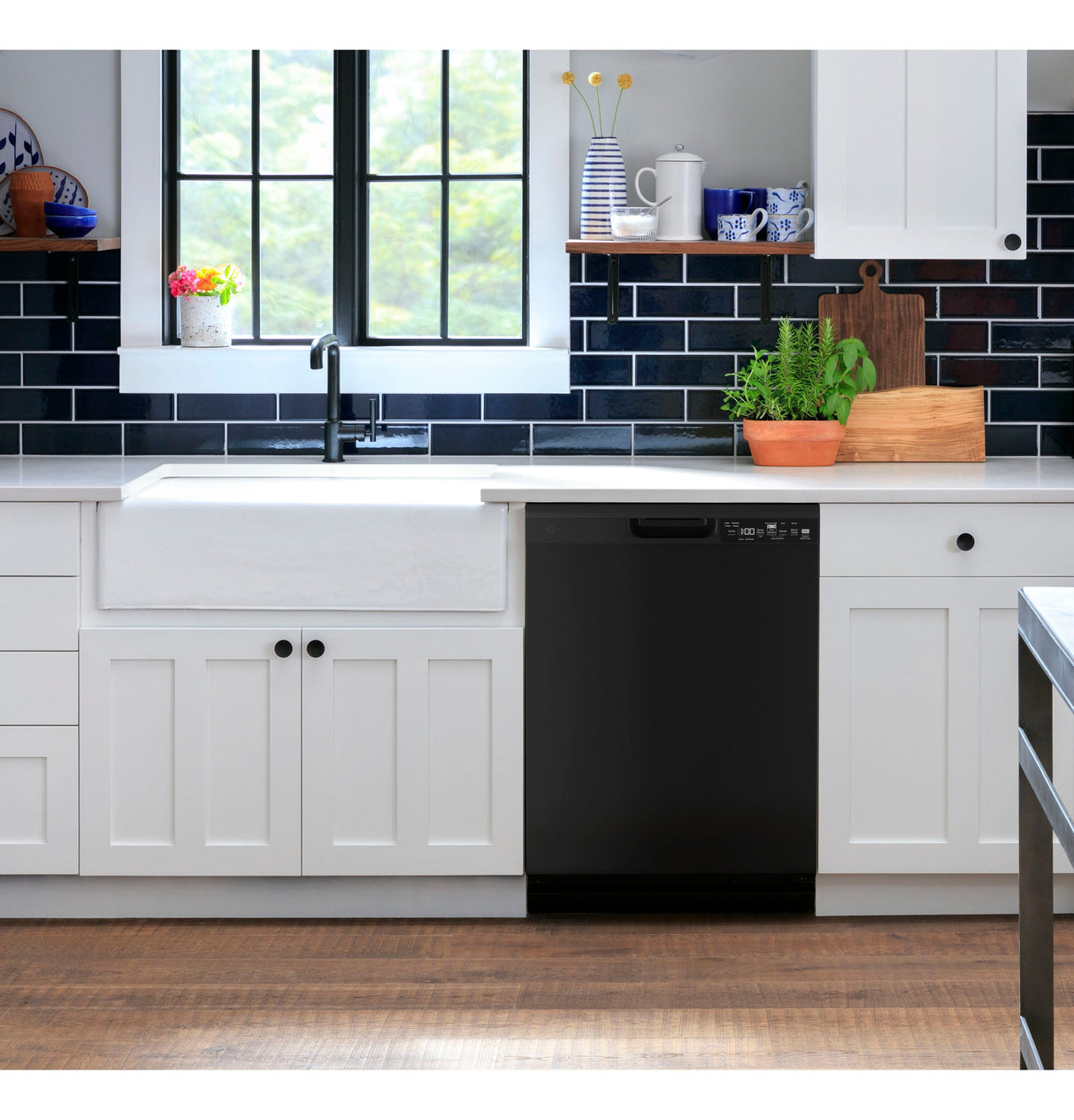 GE Front Control with Plastic Interior Dishwasher with Sanitize Cycle Dry Boost GDF550PGRBB