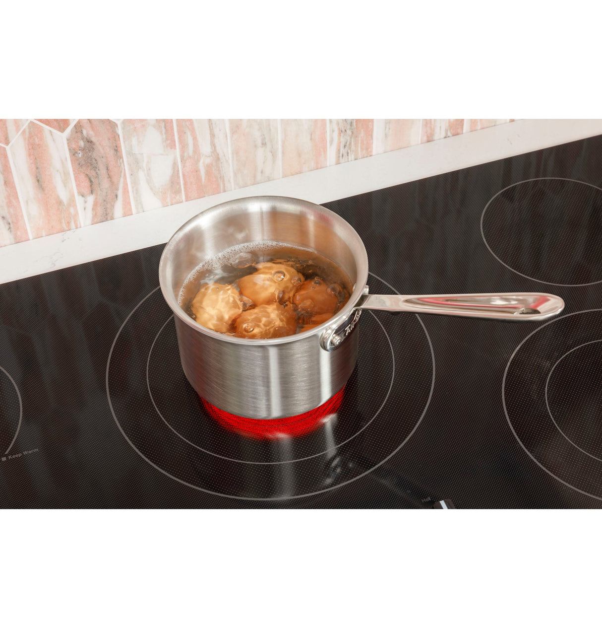 GE 30" Built-In knob Control Electric Cooktop JEP5030DTBB