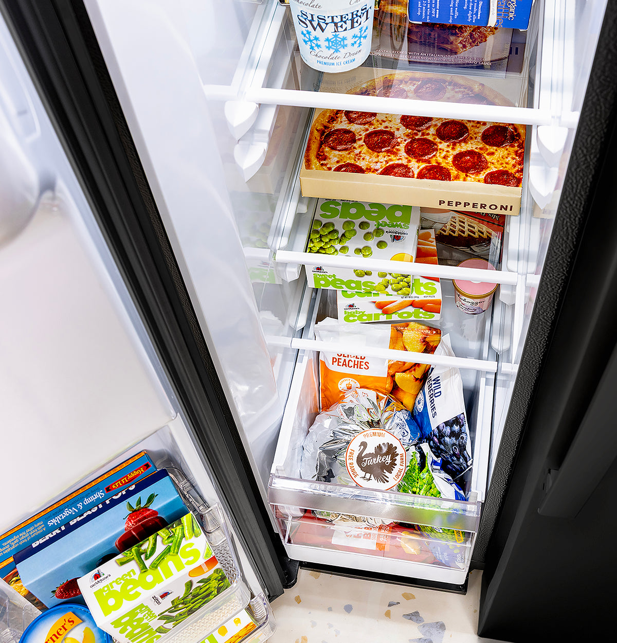 GE 23.6 Cu. Ft. Counter-Depth Side-By-Side Refrigerator with Extra Tall Dispenser and In-Door Icemaker GZS24NGYBB