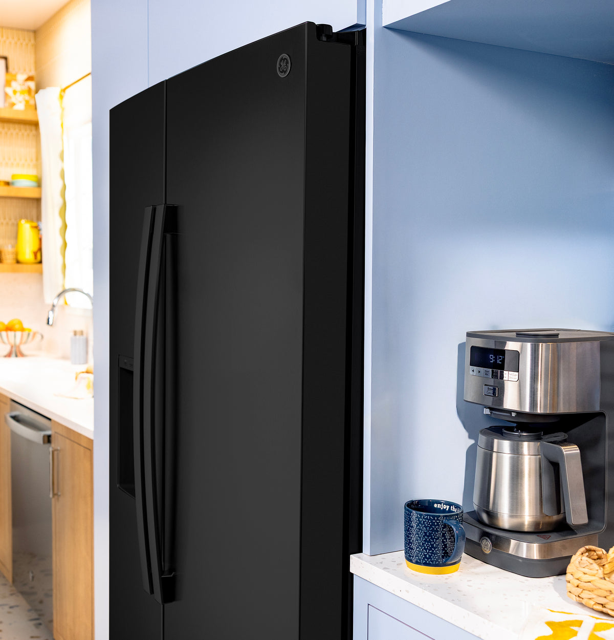 GE 23.6 Cu. Ft. Counter-Depth Side-By-Side Refrigerator with Extra Tall Dispenser and In-Door Icemaker GZS24NGYBB