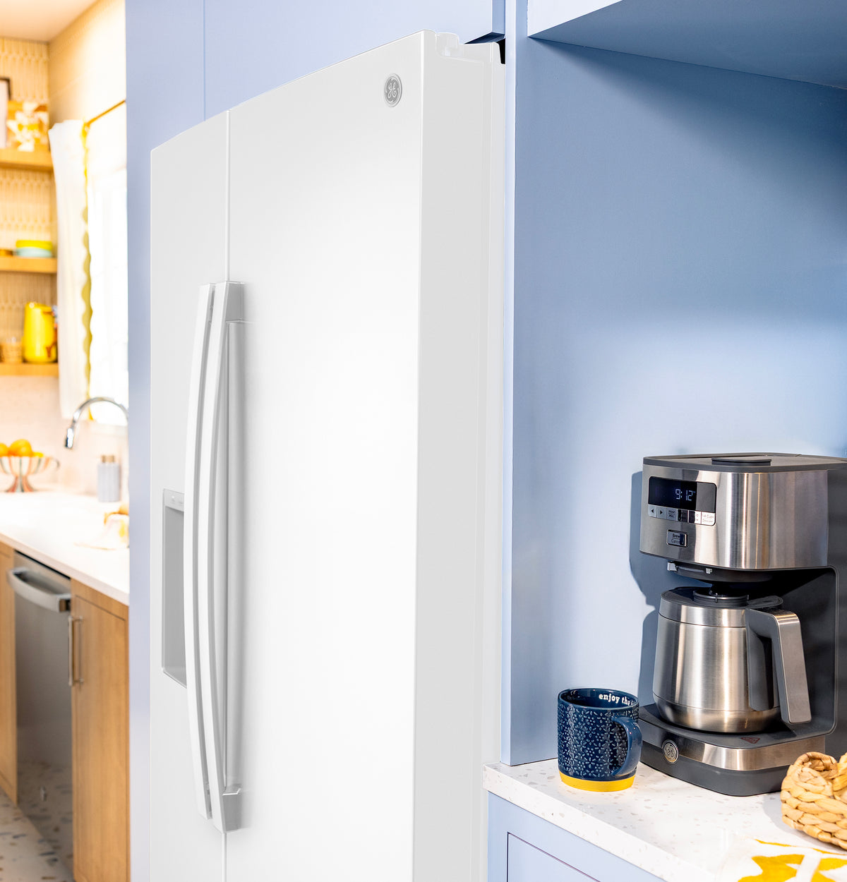 GE 23.6 Cu. Ft. Counter-Depth Side-By-Side Refrigerator with Extra Tall Dispenser and In-Door Icemaker GZS24NGYWW