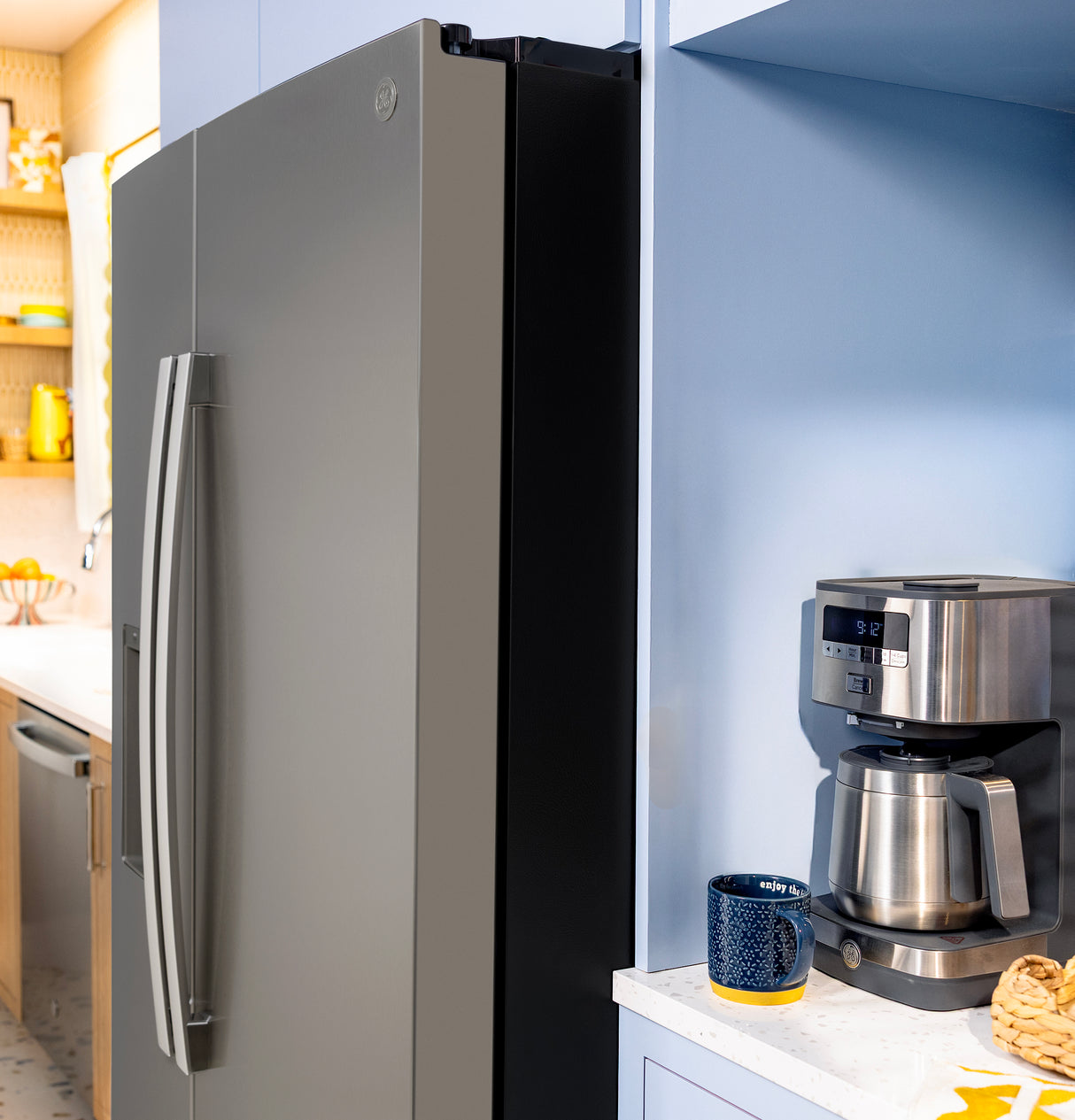 GE® 27.9 Cu. Ft. Side-By-Side Refrigerator with Extra Tall Dispenser and In-Door Icemaker GSS28NMYES