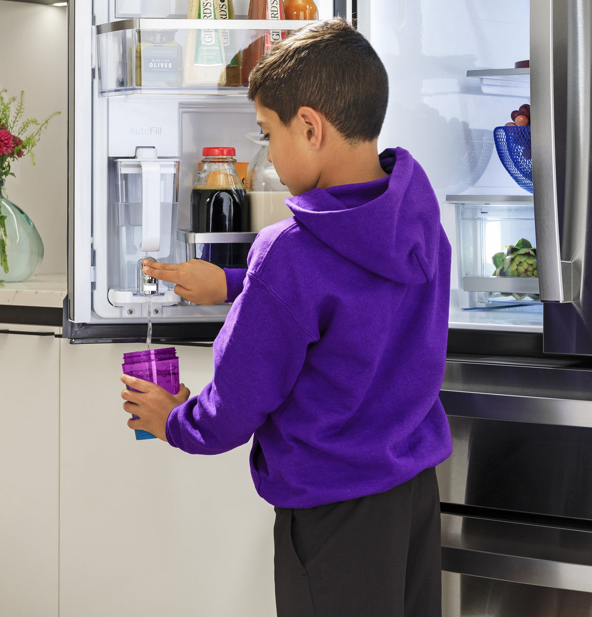 GE Profile™ ENERGY STAR® 22.9 Cu. Ft. Counter-Depth Quad-Door Refrigerator with Dual-Dispense AutoFill Pitcher and Door in Door PHD23BYWFS