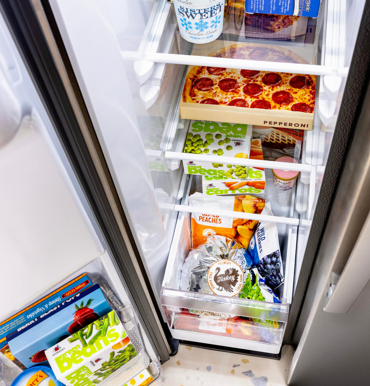 GE 23.6 Cu. Ft. Counter-Depth Side-By-Side Refrigerator with Extra Tall Dispenser and In-Door Icemaker GZS24NYYFS