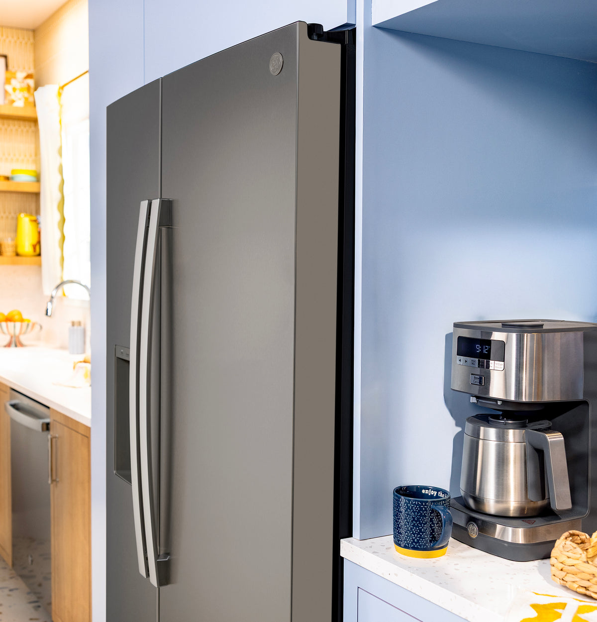 GE 23.6 Cu. Ft. Counter-Depth Side-By-Side Refrigerator with Extra Tall Dispenser and In-Door Icemaker GZS24NMYES