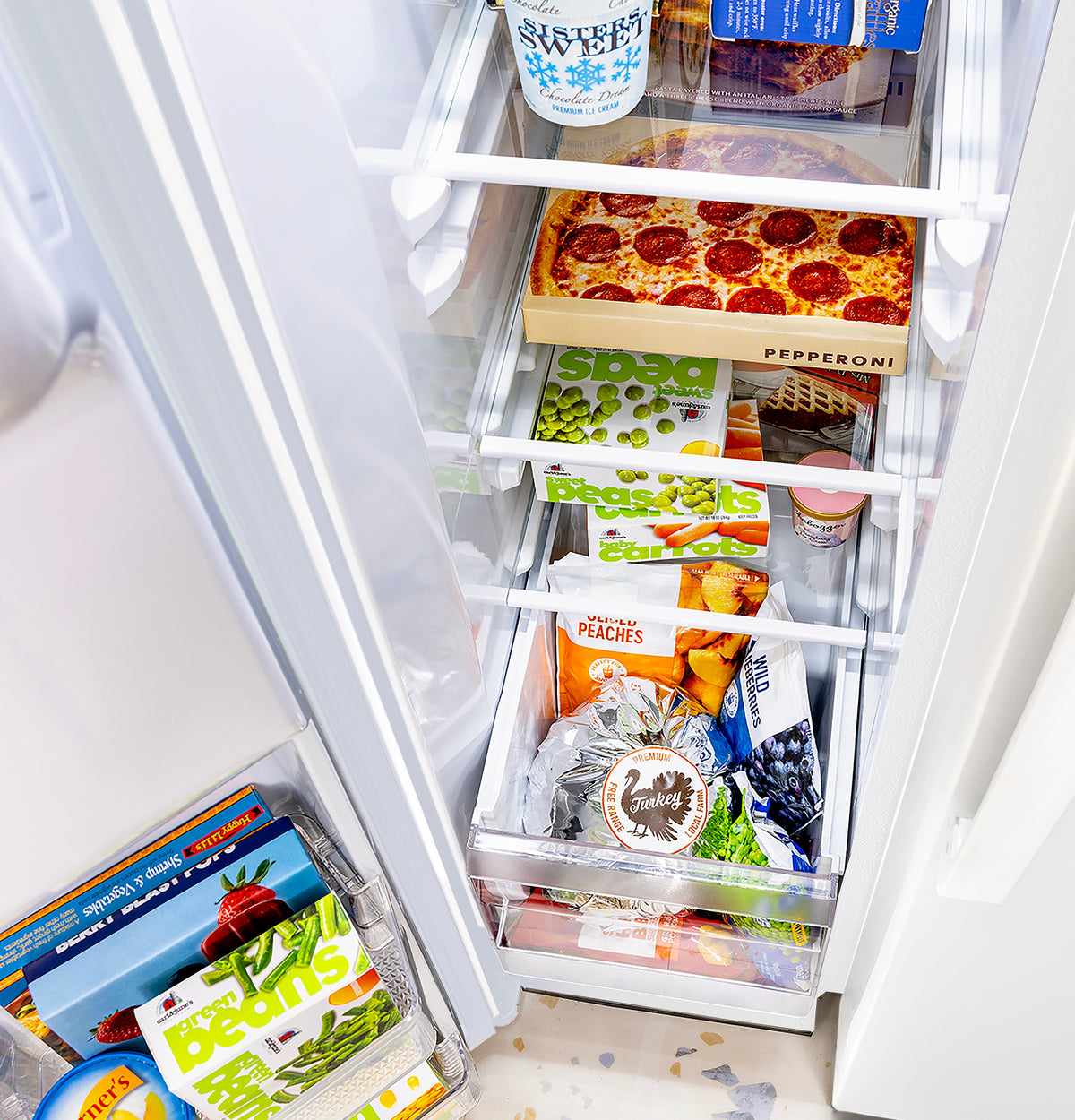 GE 23.6 Cu. Ft. Counter-Depth Side-By-Side Refrigerator with Extra Tall Dispenser and In-Door Icemaker GZS24NGYWW